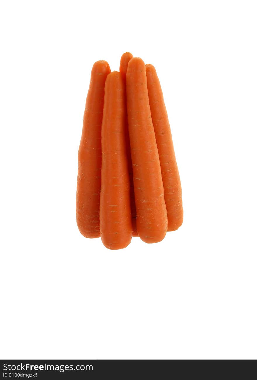 Carrots standing in the pyramid isolated on the white background