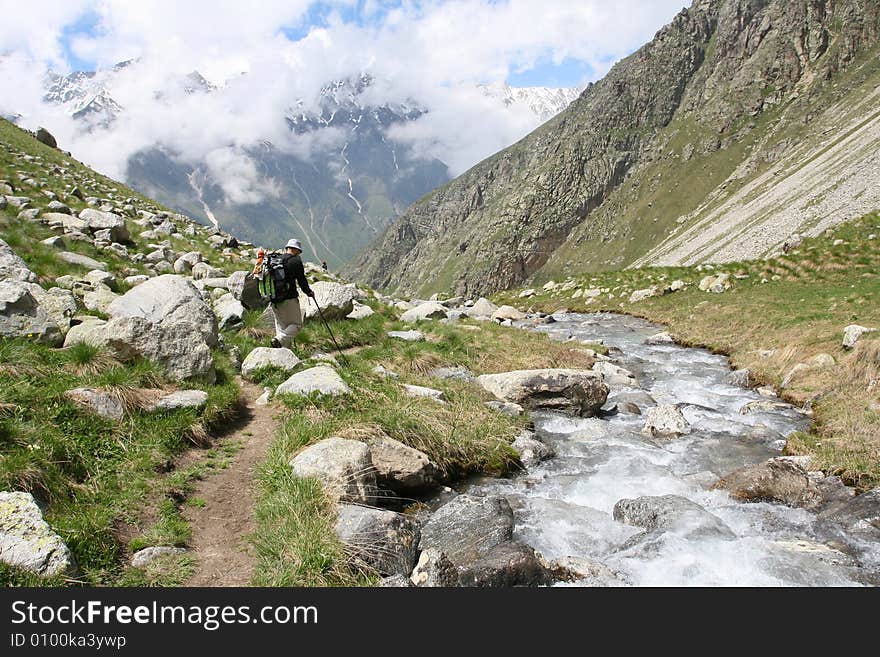 Hikers on the cliff in mountain,. Hikers on the cliff in mountain,