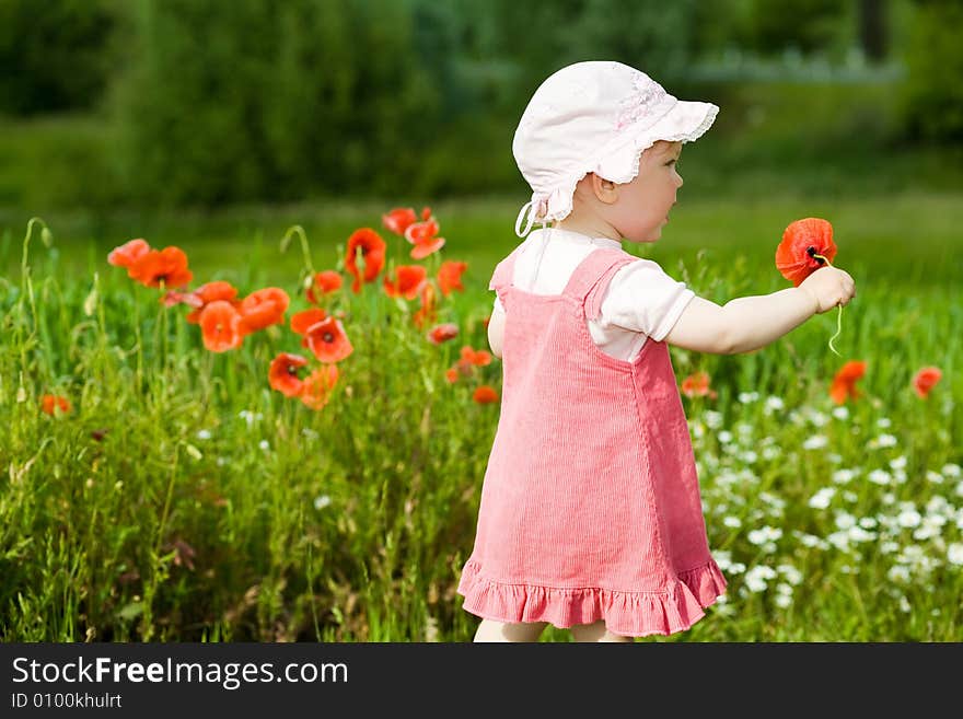 Baby with red flower