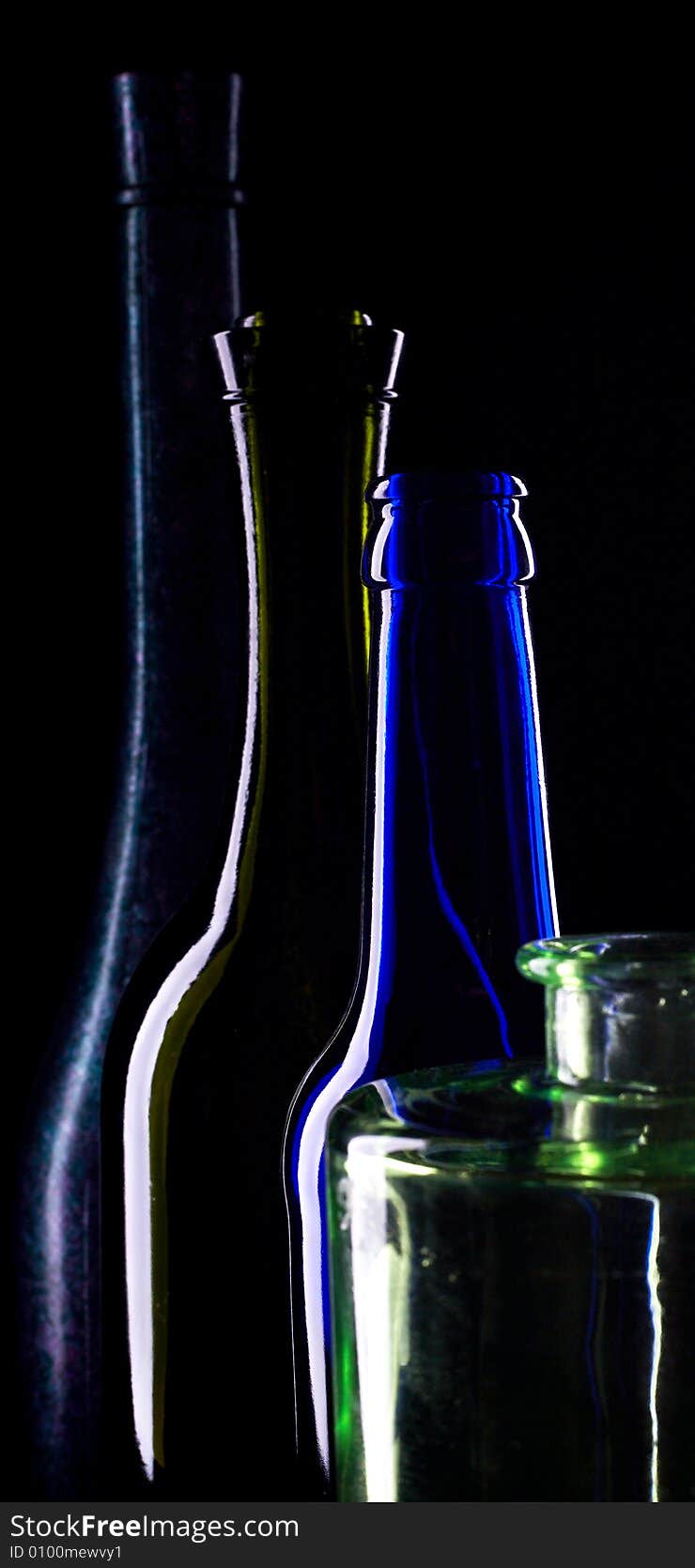 An image of silhouettes of bottles of wine in line