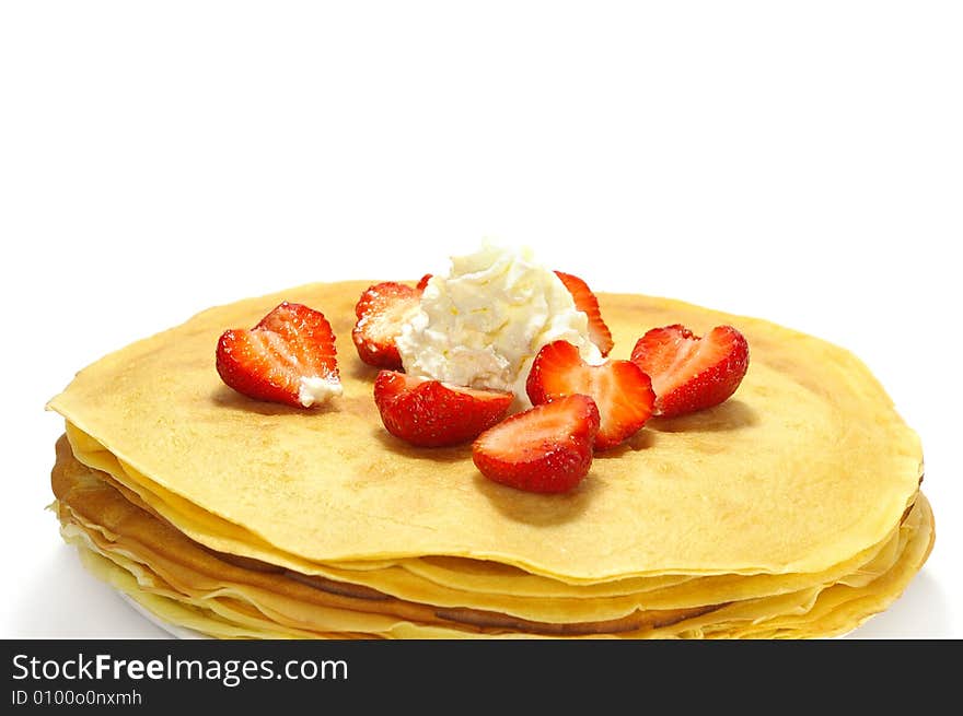 Pancakes filled with whipped cream cheese and strawberry. Pancakes filled with whipped cream cheese and strawberry