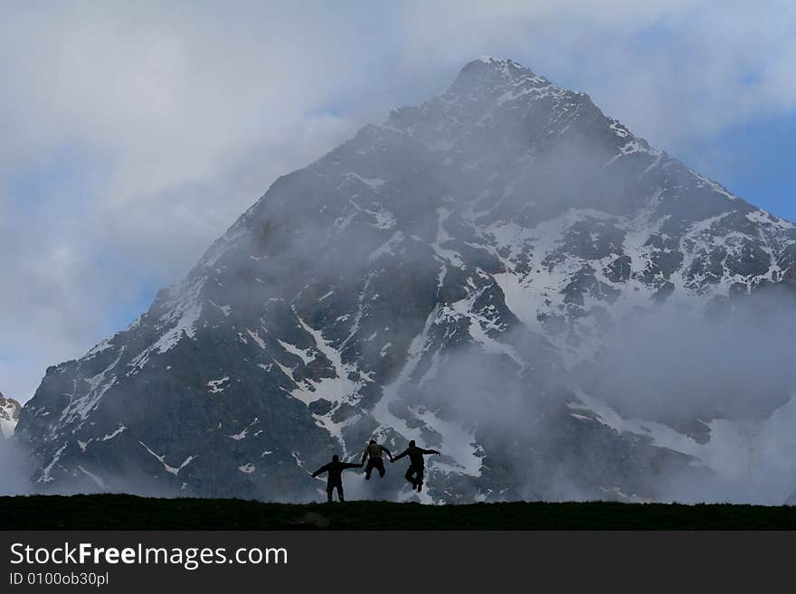 Hikers on the cliff in mountain,. Hikers on the cliff in mountain,