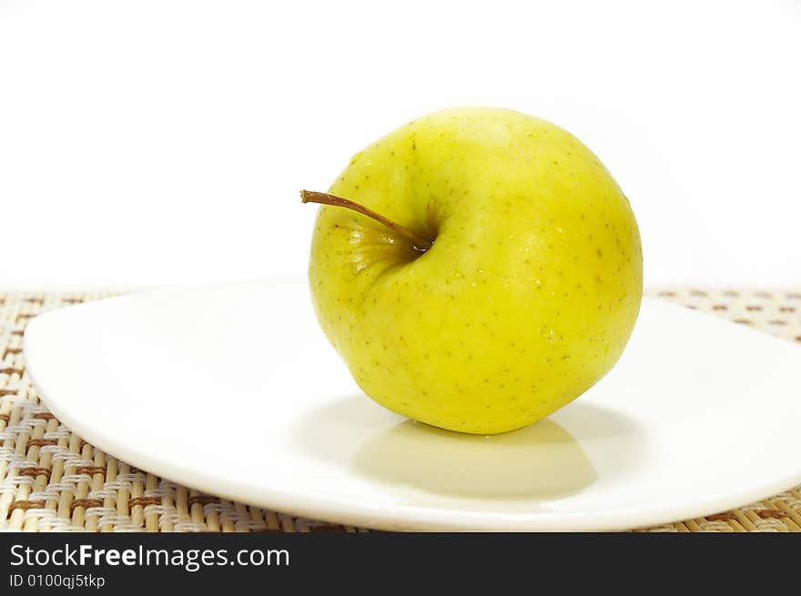 Apple On The White Plate