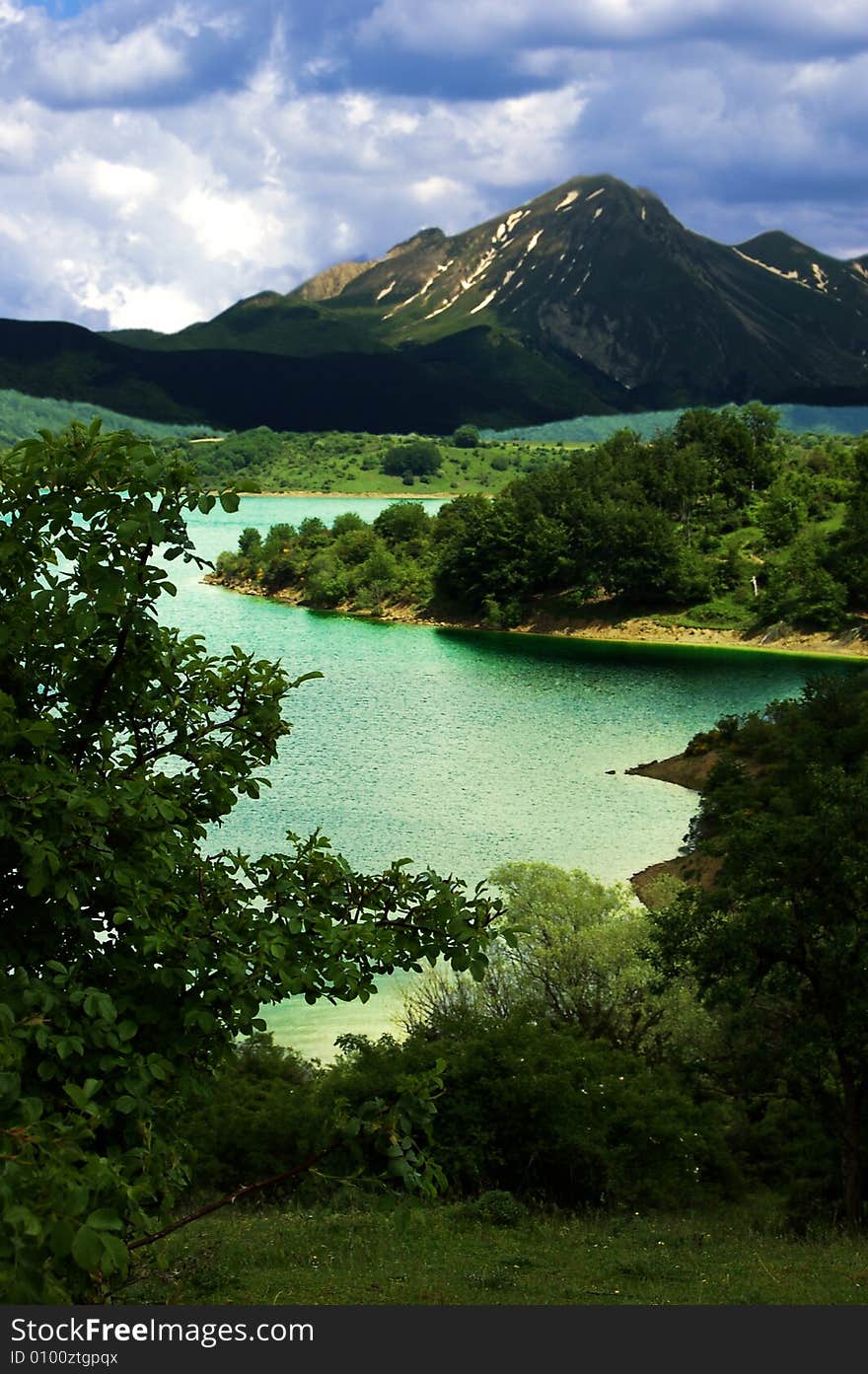 A view of a lake in the mountain. A view of a lake in the mountain