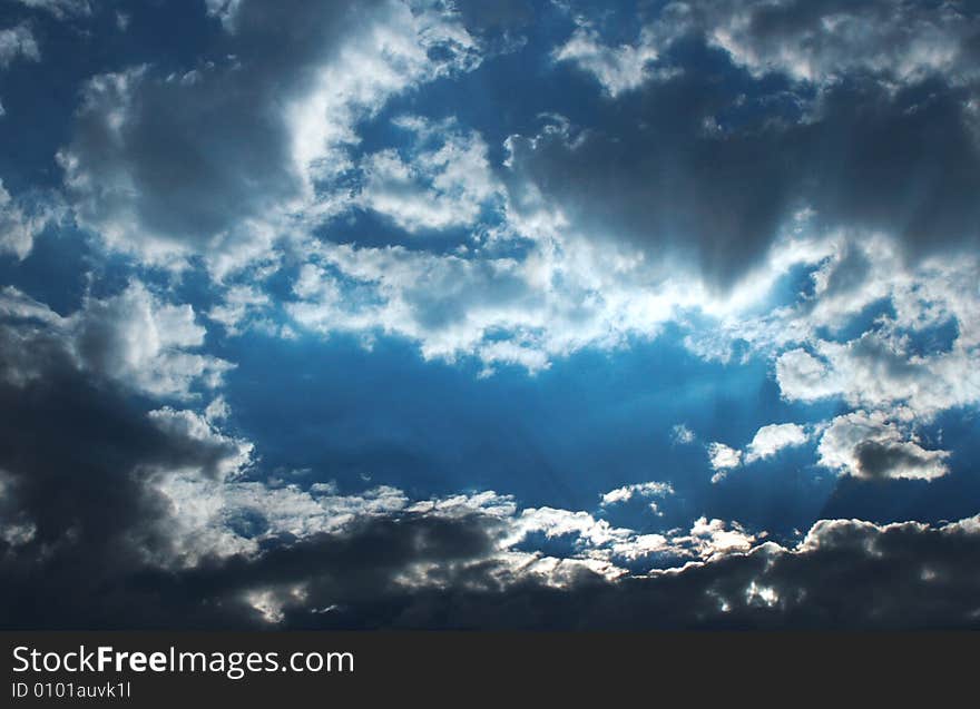 Evening cloudy sky with rays of light. Evening cloudy sky with rays of light