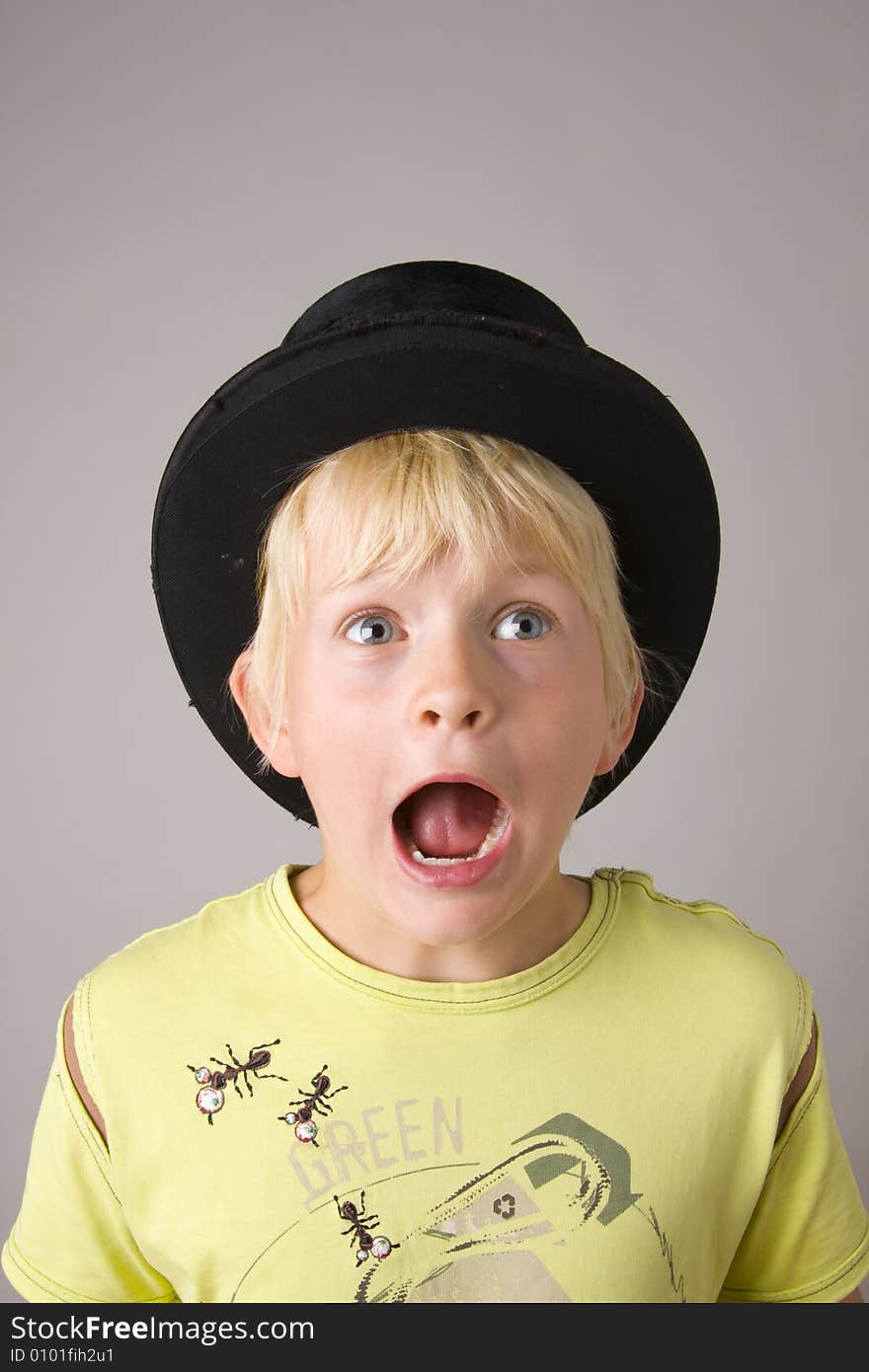 Portrait of a young boy shouting madly