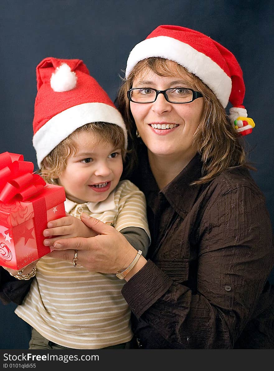 Small family with christmas present