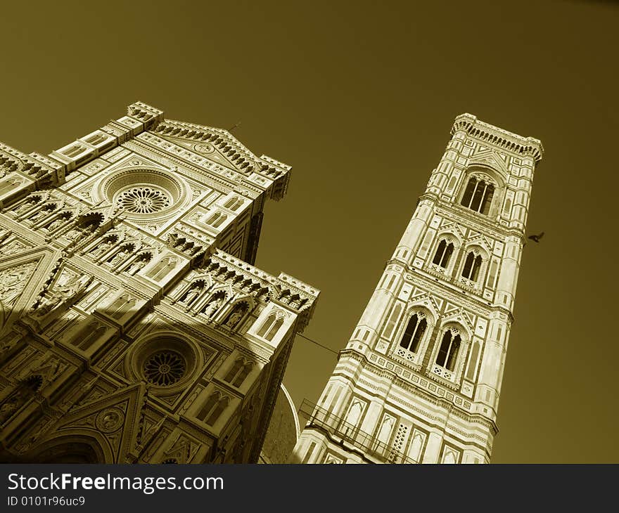 A suggestive monochrome of the Cathedral of Santa Maria del Fiore and Giotto's belltower in Florence. A suggestive monochrome of the Cathedral of Santa Maria del Fiore and Giotto's belltower in Florence