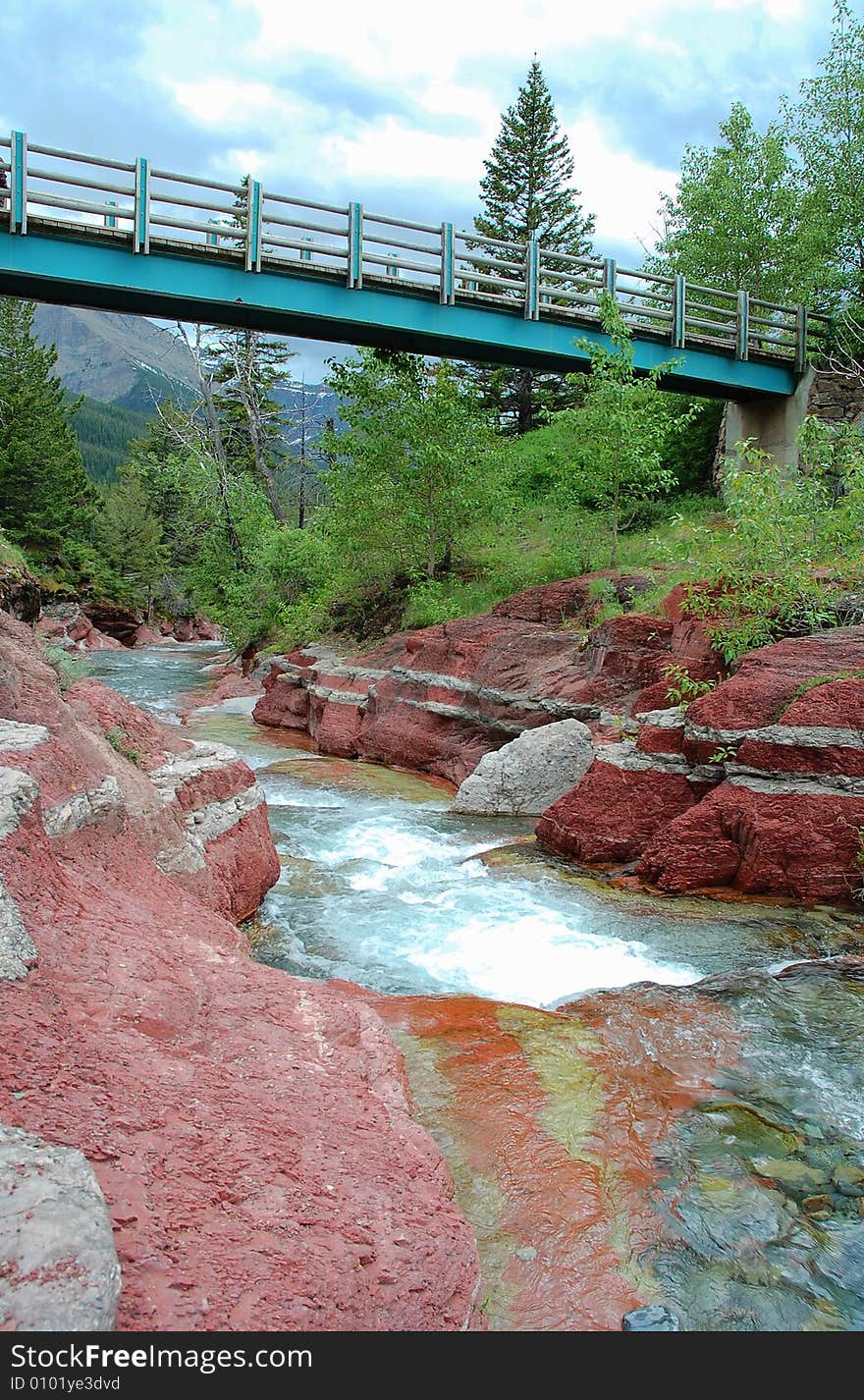 A bridge over the red rock canyon in waterton lakes national park, alberta, canada