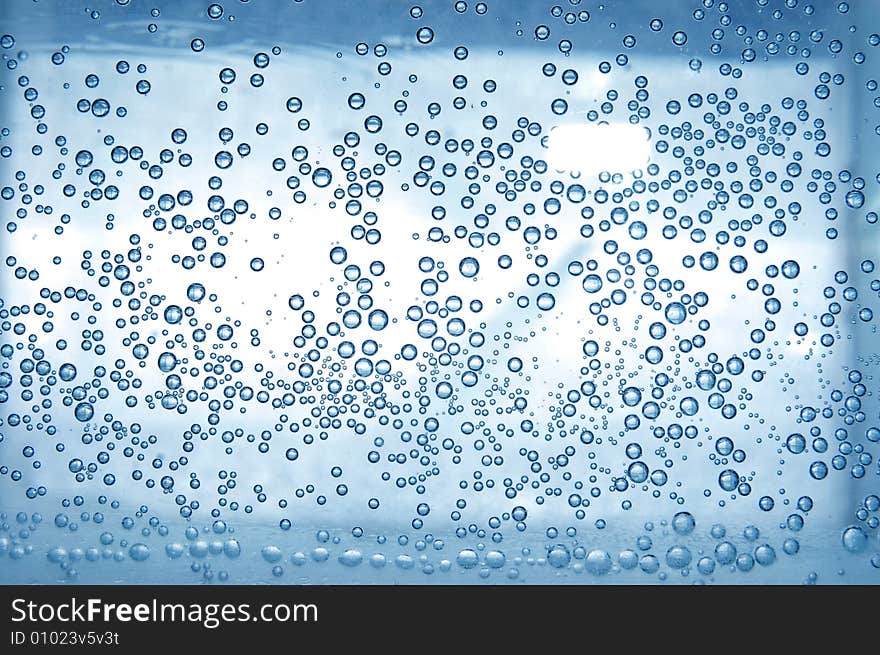 Blue water with bubbles high resolution image