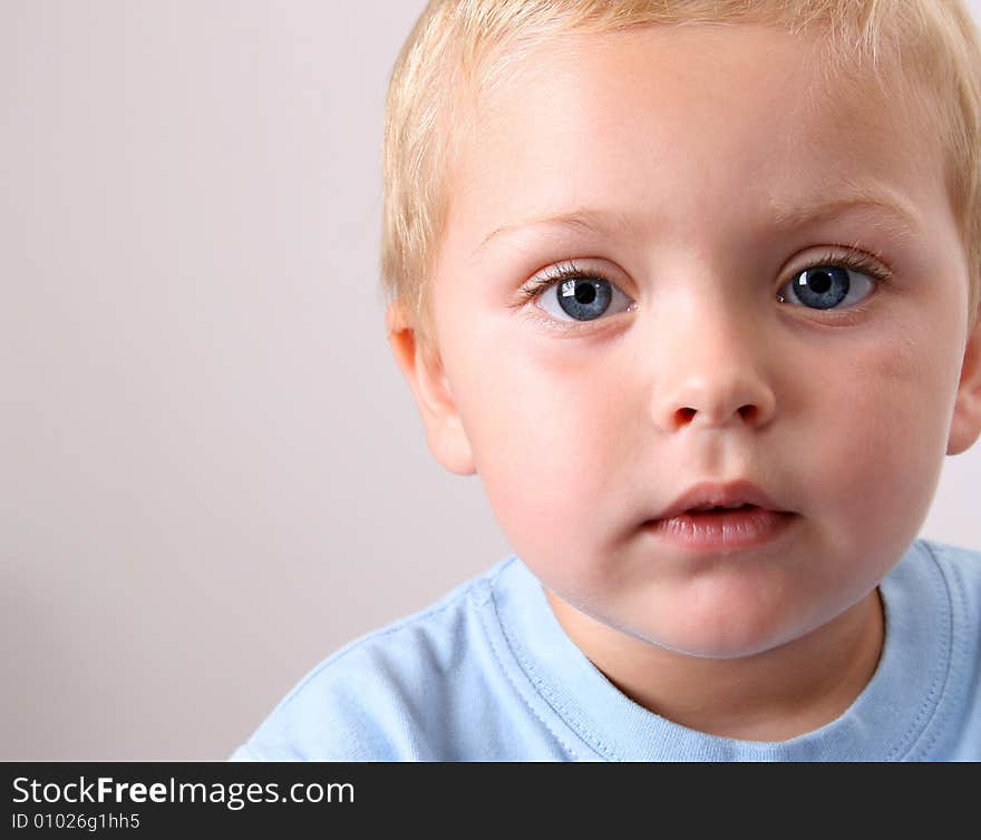 Beuatiful Blond toddler with big blue eyes. Beuatiful Blond toddler with big blue eyes