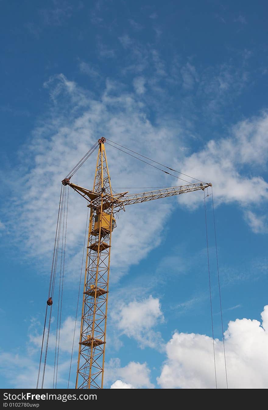 Lifting construction crane at blue sky 1