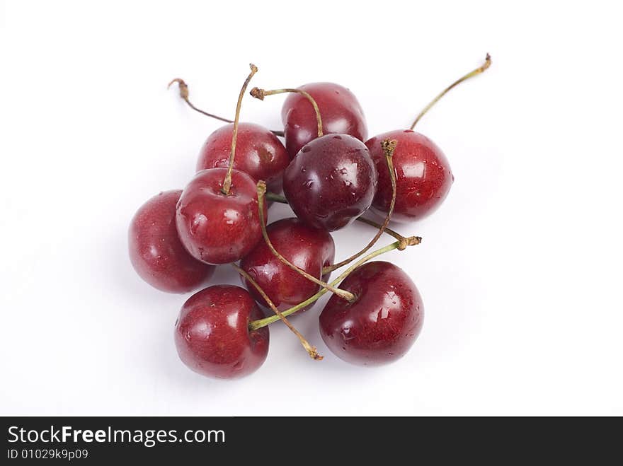 Sweet fresh red cherries isolated on white background. Sweet fresh red cherries isolated on white background