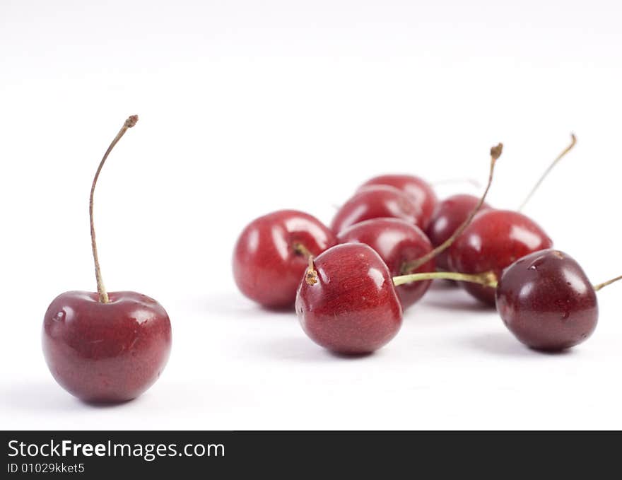 Sweet fresh red cherries isolated on white background. Sweet fresh red cherries isolated on white background