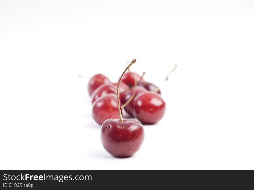 Sweet fresh red cherries isolated on white background. Sweet fresh red cherries isolated on white background