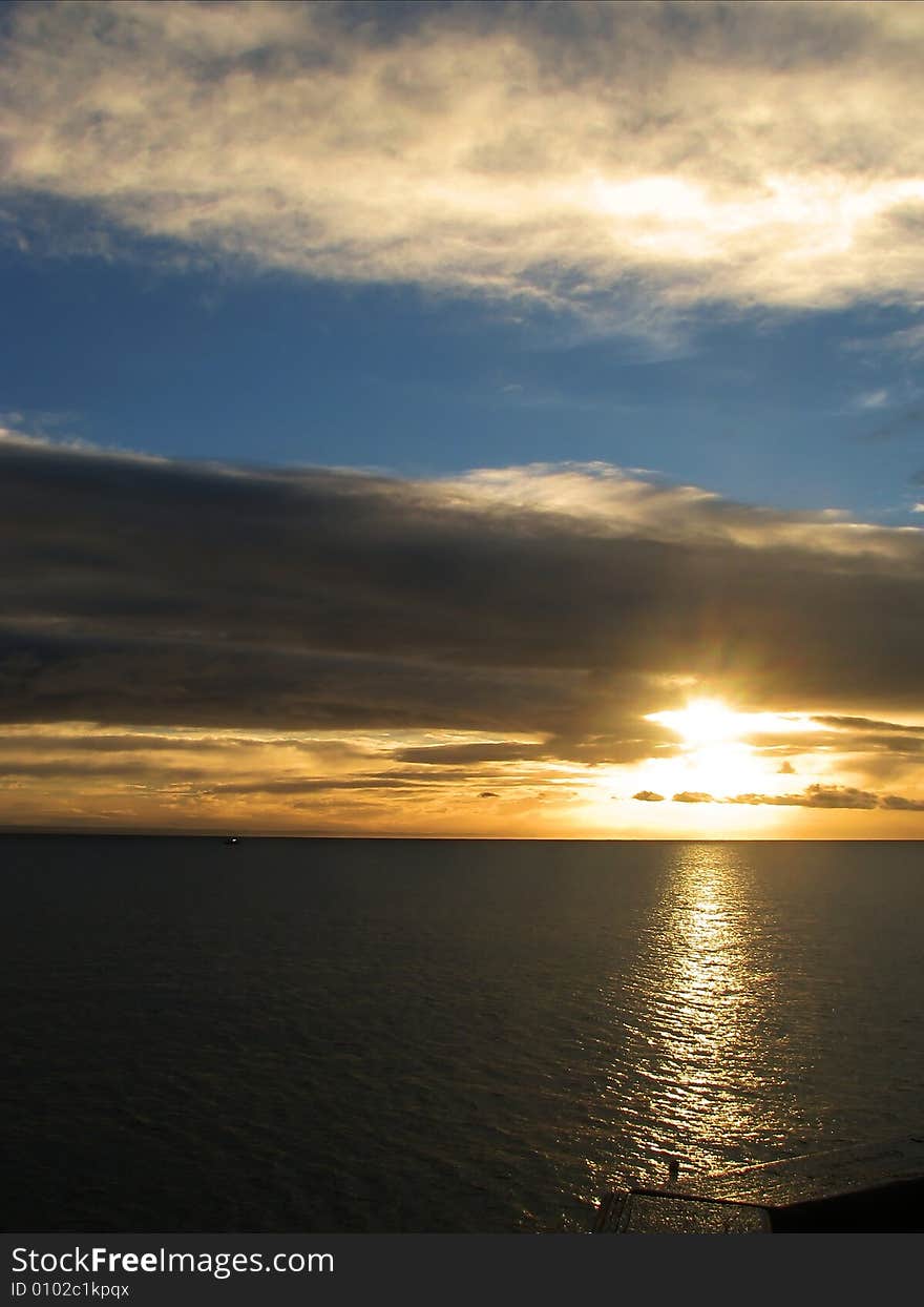 Sunrise and clouds over ocean