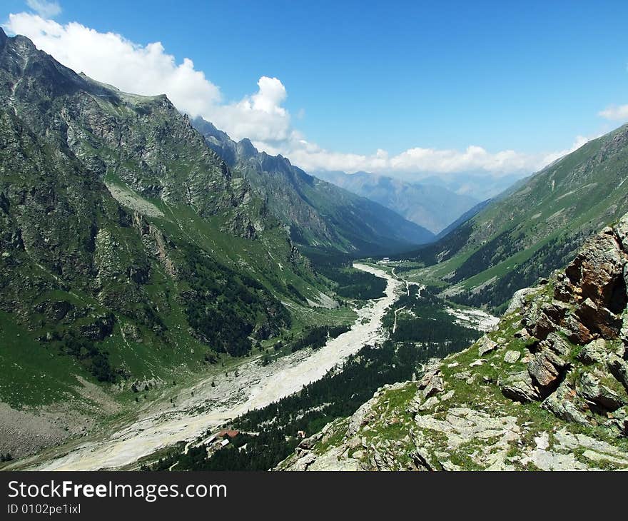 Green slopes of mountains in Cremia and clouds. Green slopes of mountains in Cremia and clouds