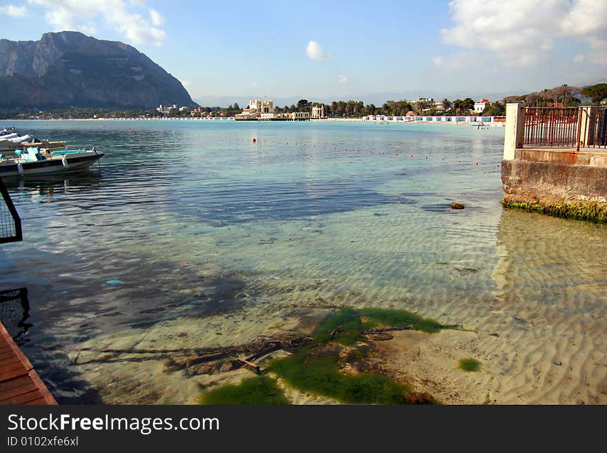 Mediterranean furnished beach area with colorful huts. Palermo (island of Sicily) Italy. Mediterranean furnished beach area with colorful huts. Palermo (island of Sicily) Italy