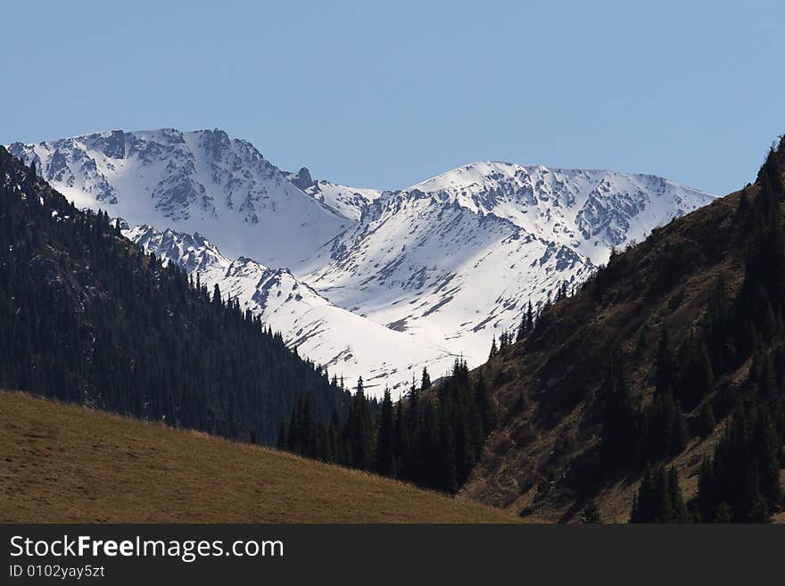 Snow mountain tops in the spring. Snow mountain tops in the spring