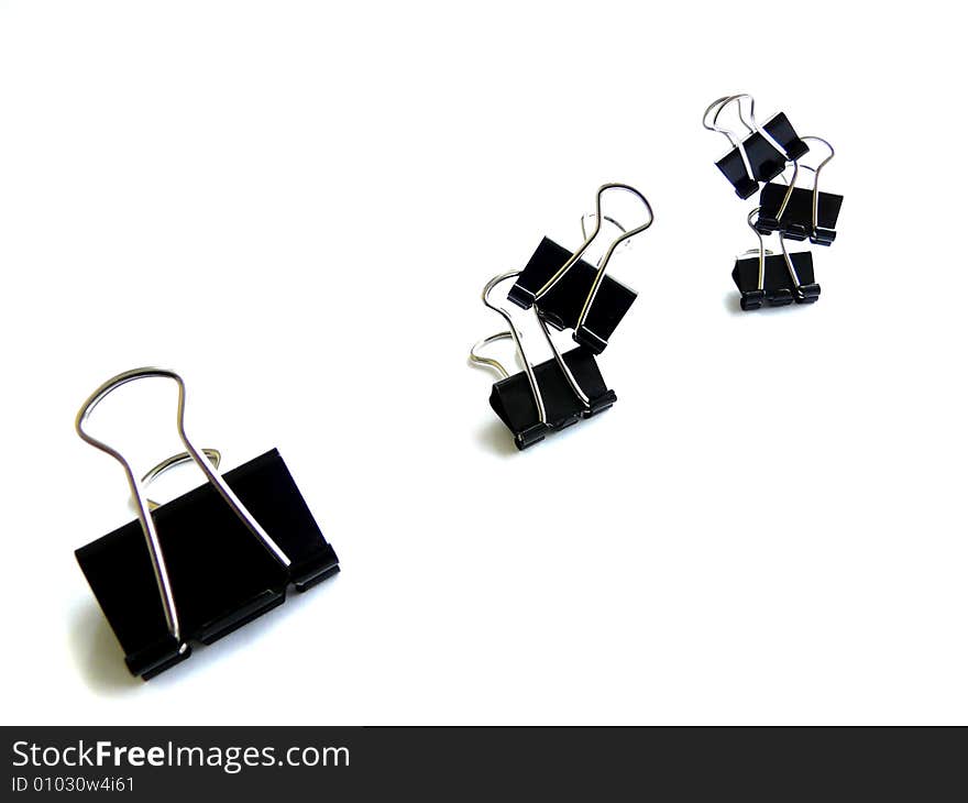 Office binder clips isolated on the white. Office binder clips isolated on the white