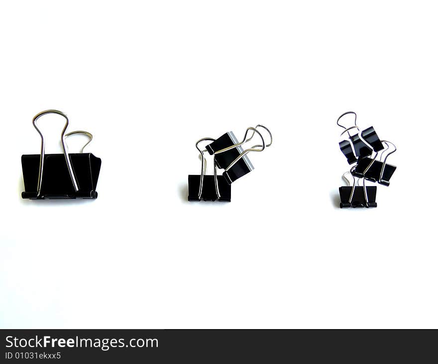 Office binder clips isolated on the white. Office binder clips isolated on the white