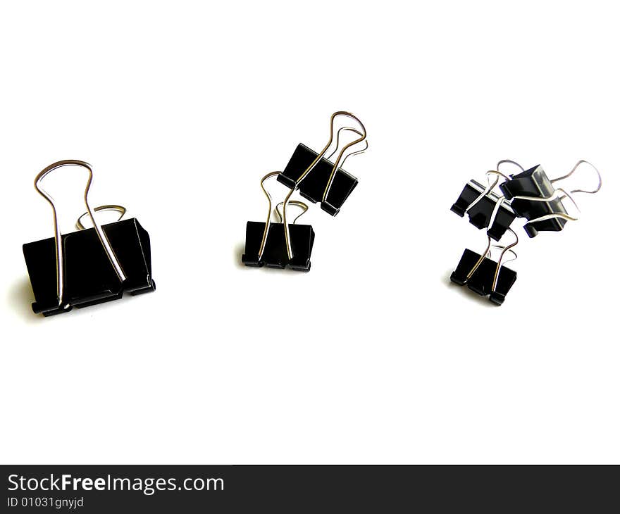 Office binder clips isolated on the white. Office binder clips isolated on the white