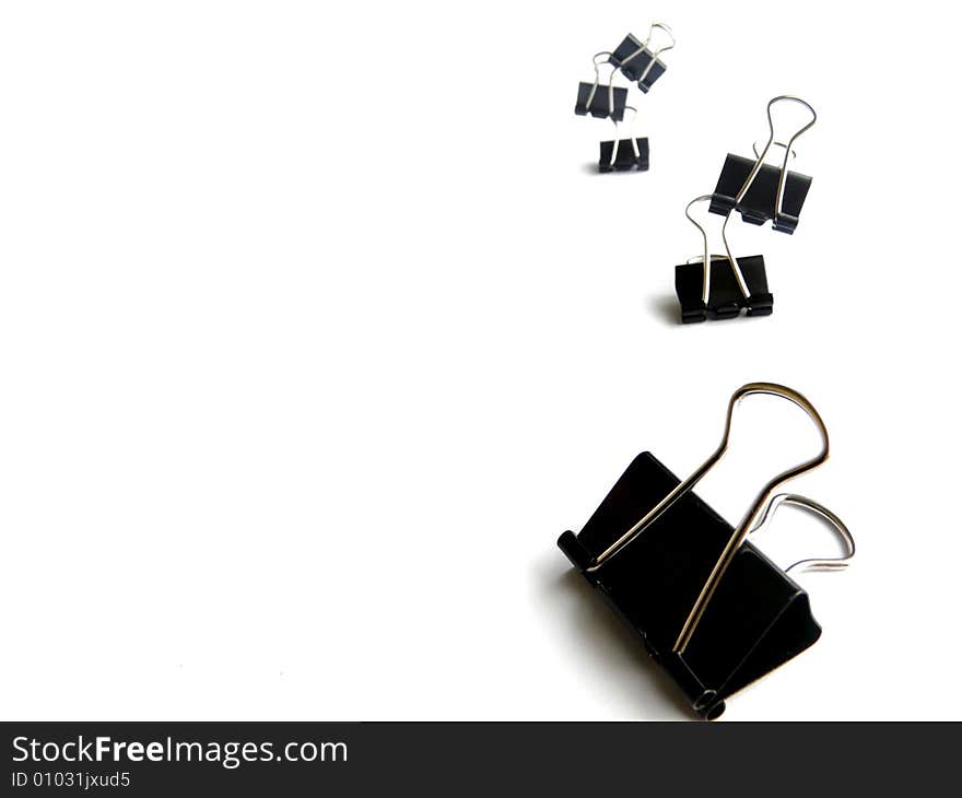 Office binder clips isolated on the white. Office binder clips isolated on the white