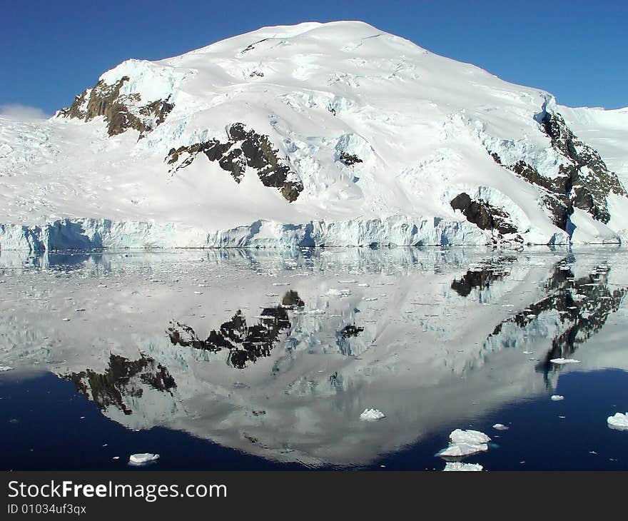 Reflection of icebergs, Sunny day in Antarctica. Reflection of icebergs, Sunny day in Antarctica