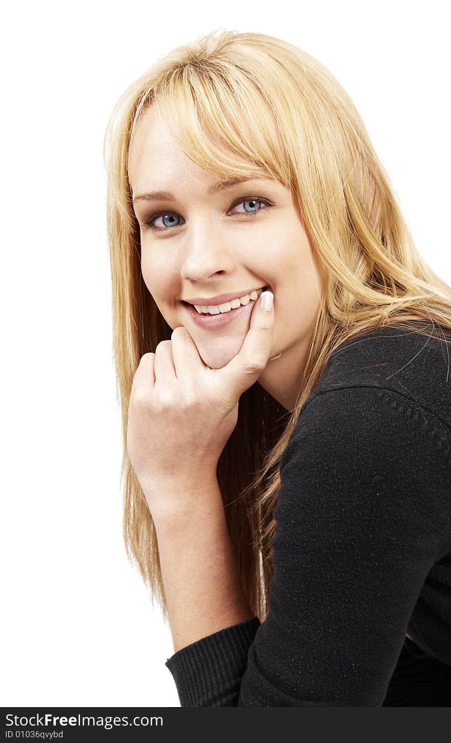 Beautiful blonde business woman with natural makeup with her hand on her chin. Beautiful blonde business woman with natural makeup with her hand on her chin