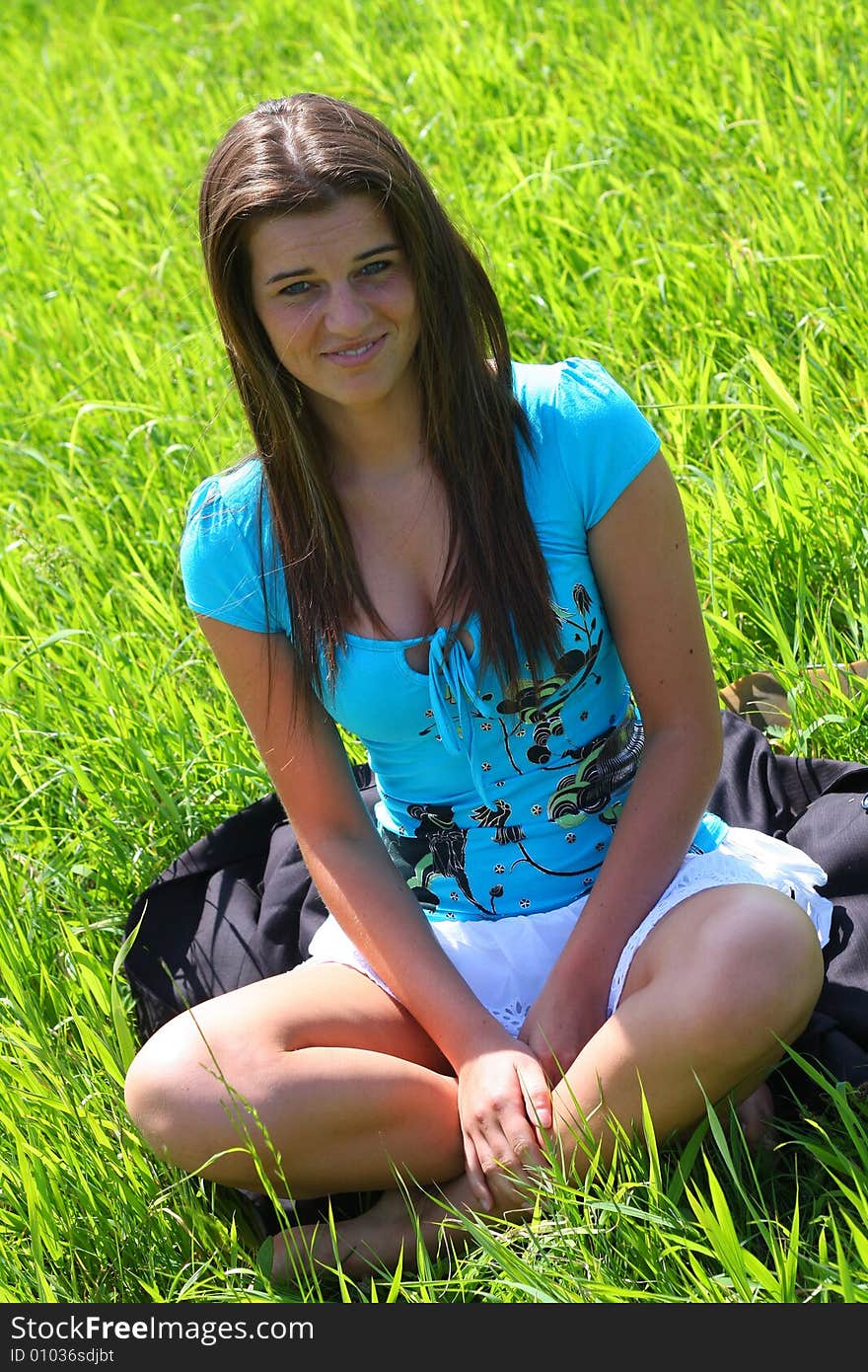 Young woman on the meadow in the summer. Young woman on the meadow in the summer.