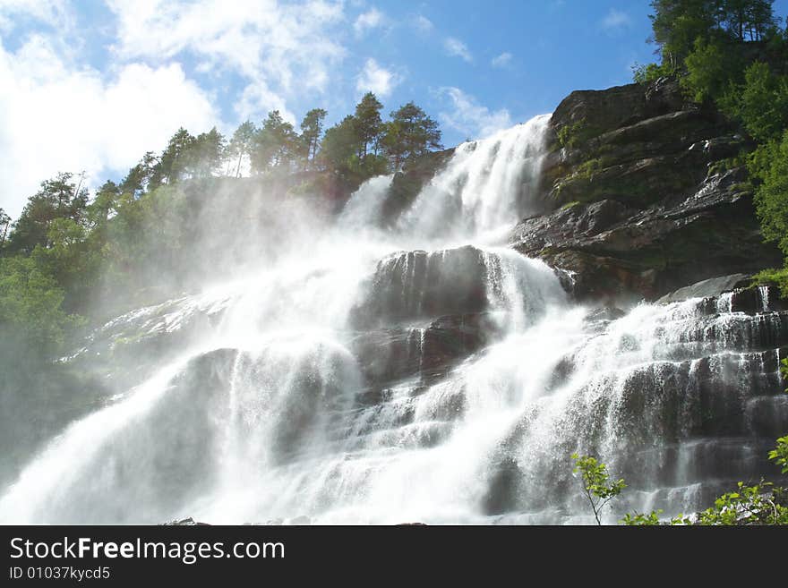 Waterfall Under The Shining Sun