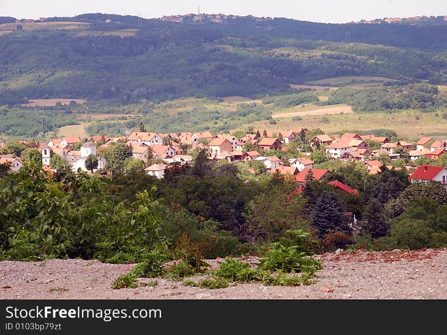 Rural landscape with houses and green hills in Serbia. Rural landscape with houses and green hills in Serbia