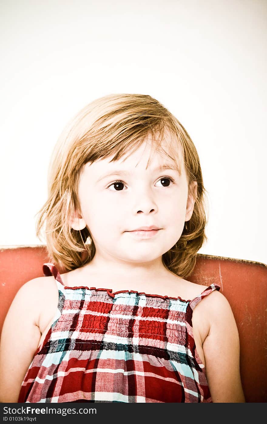 A three year old, girl making faces. A three year old, girl making faces.