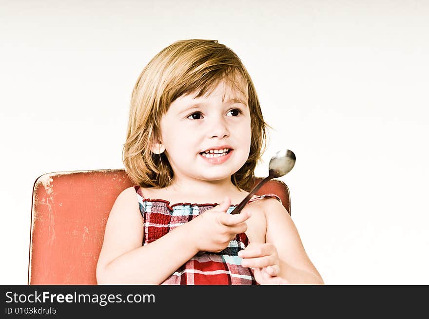 A three year old, girl making faces. A three year old, girl making faces.