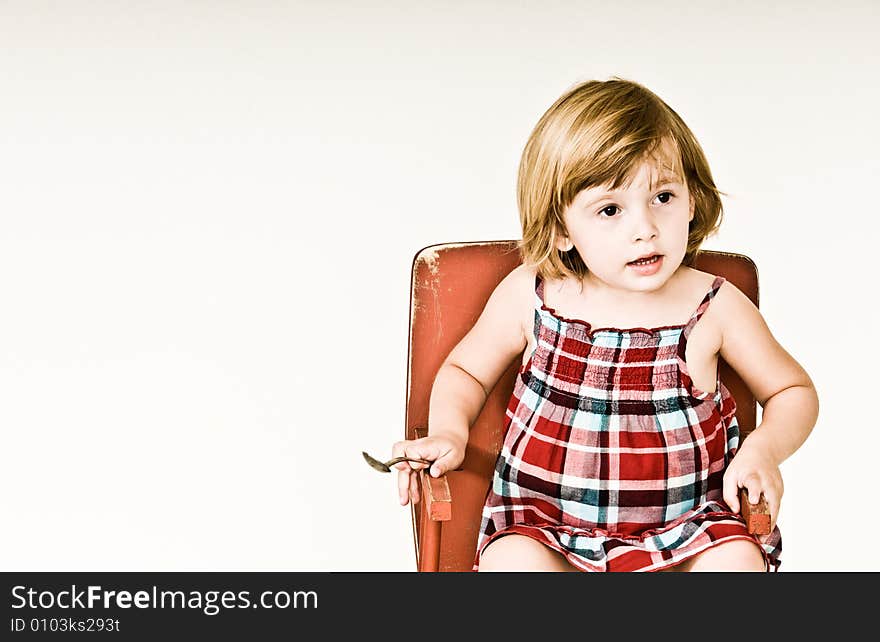 A three year old, girl making faces. A three year old, girl making faces.