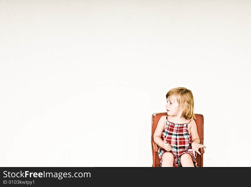 A three year old, girl making faces. A three year old, girl making faces.