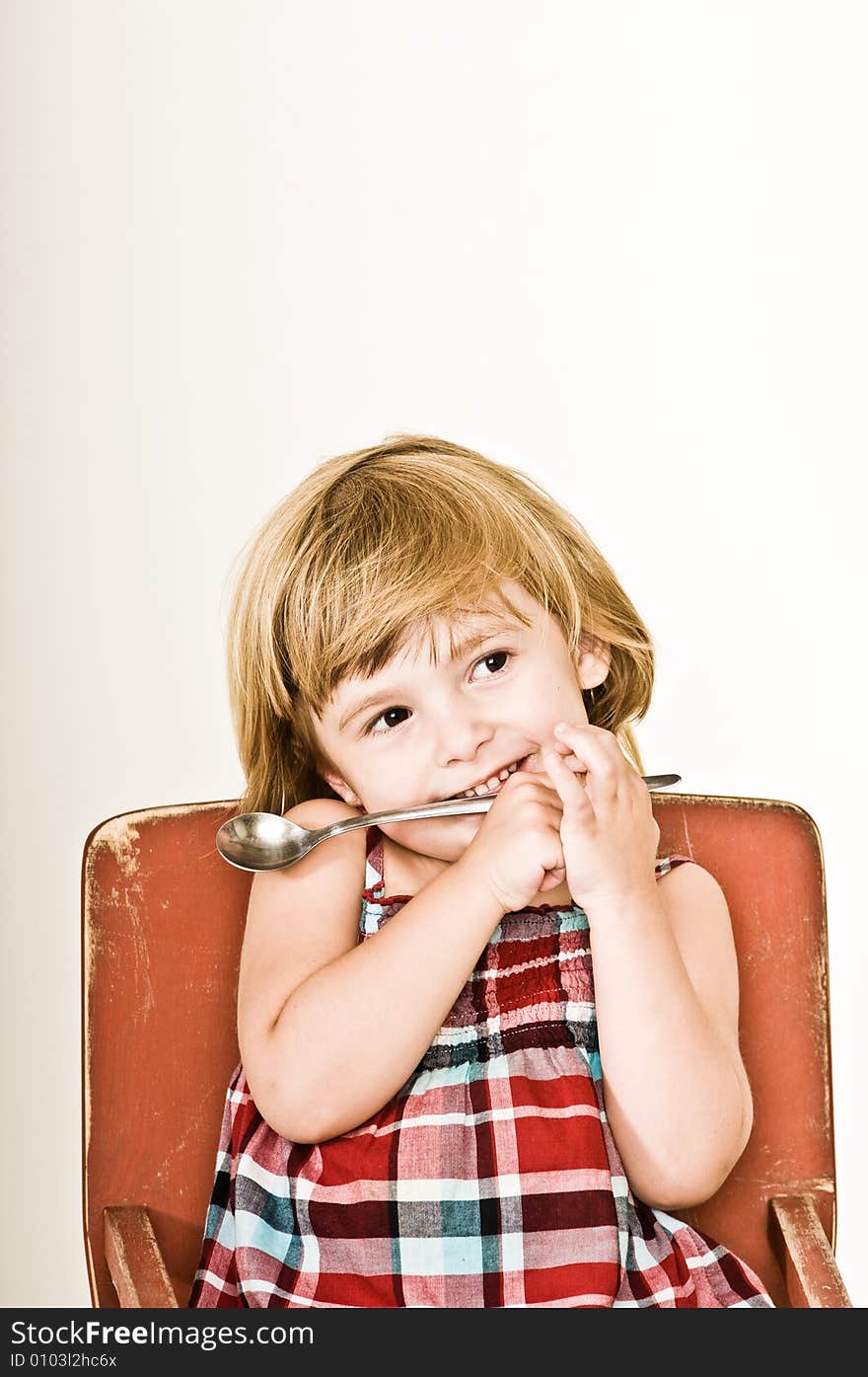 A three year old, girl making faces. A three year old, girl making faces.