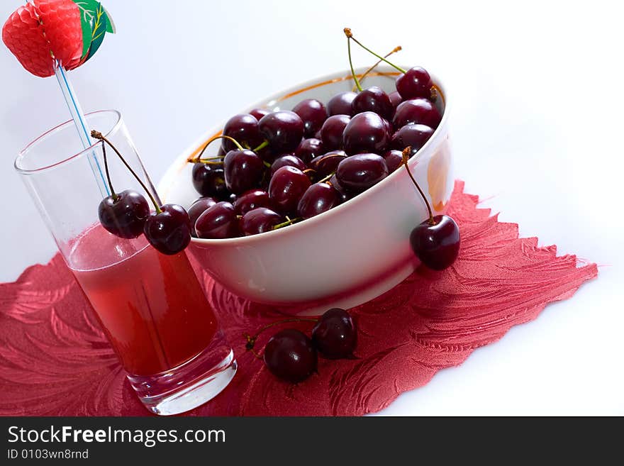 Ripe sweet cherry in a plate