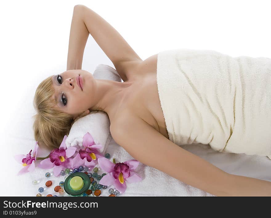 Attractive woman getting spa treatment on white