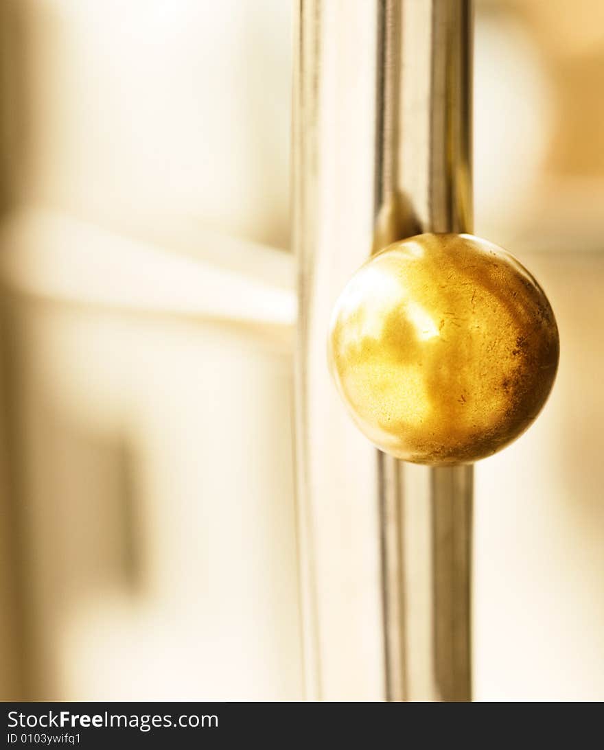 Golden round door handle