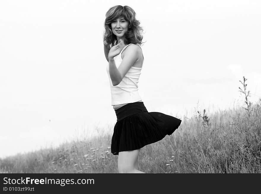 A beautiful girl running on the field