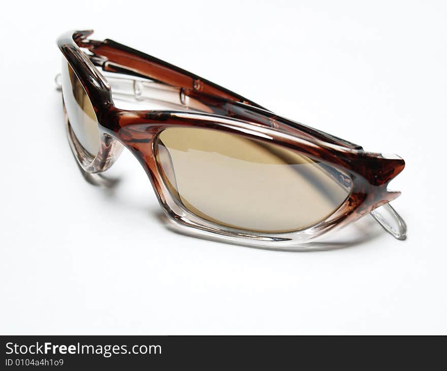 Isolated brown sprot sunglasses on white. Isolated brown sprot sunglasses on white