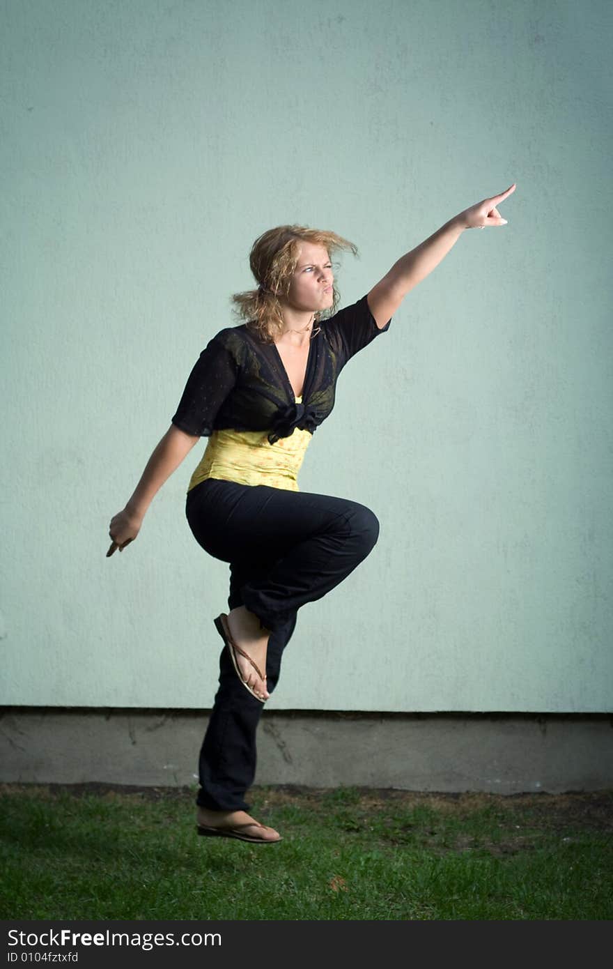 Jumping girl against the wall. Jumping girl against the wall.