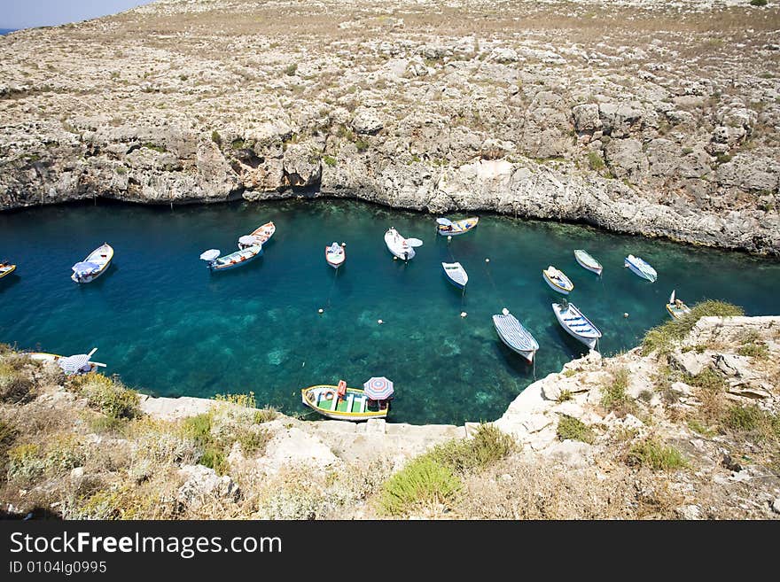 Little boats in clear water bay. Little boats in clear water bay