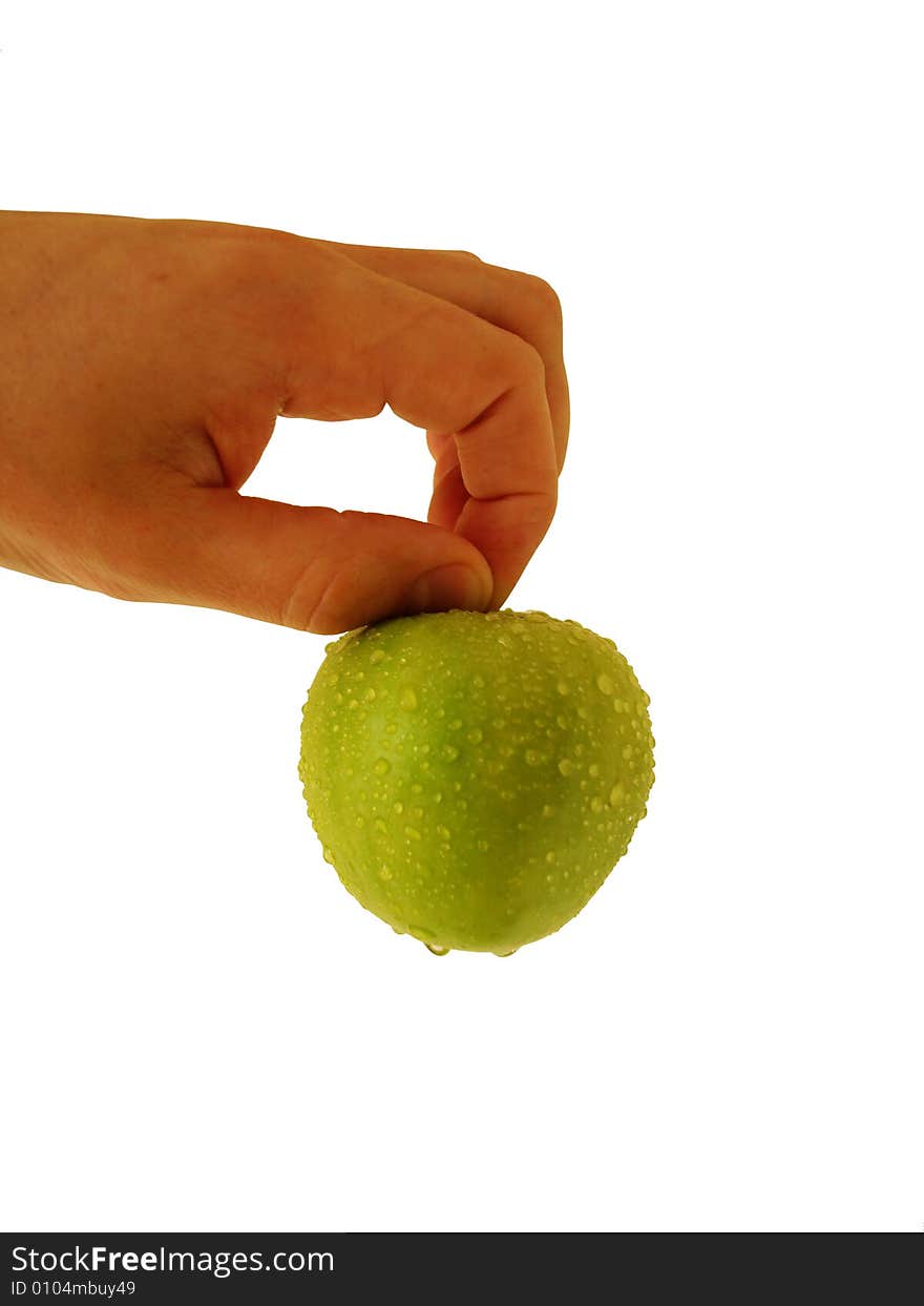 Green apple at hand