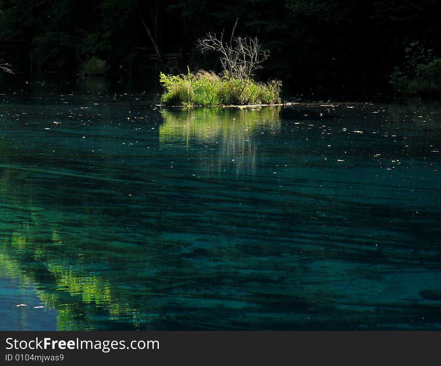 Small island in the blue lake, Sichuan, China