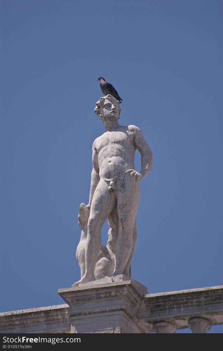 Statue on the Biblioteca Nazionale Marciana. Taken in Venice, Italy.