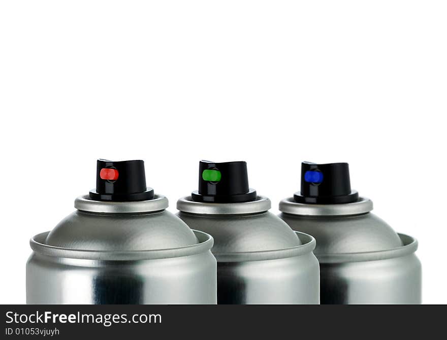 Detail of three aerosol cans RGB isolated on white