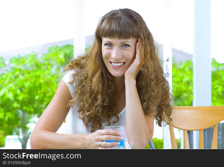 High-key portrait of young blue eyed woman on color back. High-key portrait of young blue eyed woman on color back