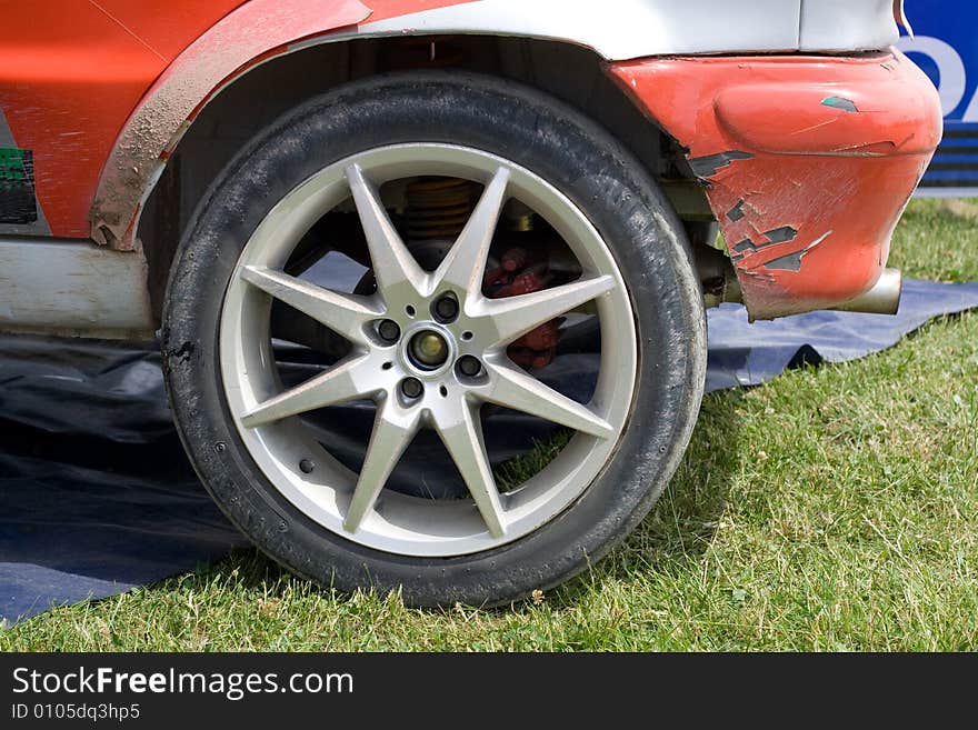 Wheels of the rally car, colored photo. Wheels of the rally car, colored photo